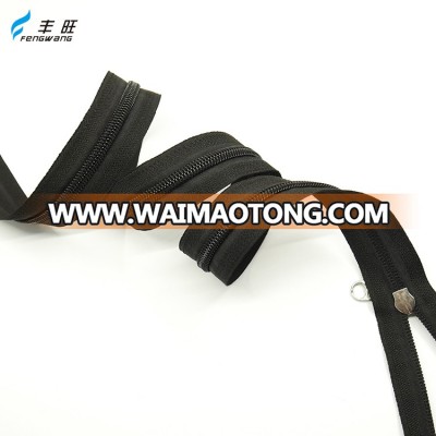 Factory wholesale custom fancy reversible #5 raw black coil long chain nylon zipper rolls for luggage bags